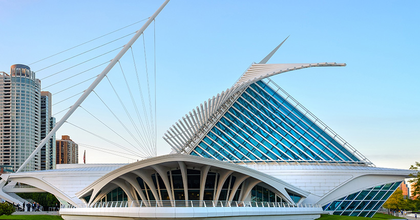 Full view of the Quadracci Pavilion with the Milwaukee skyline in the background